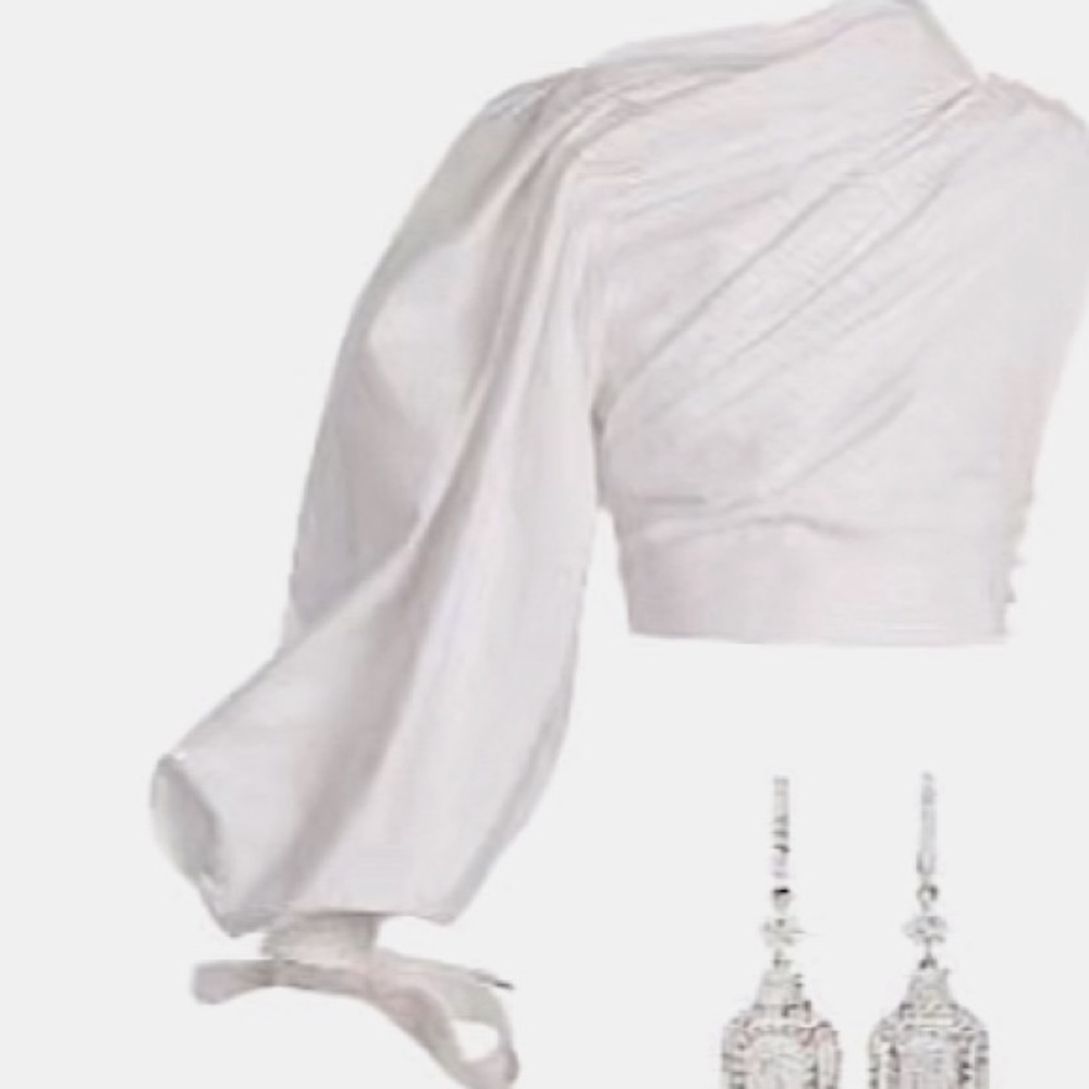 Hello everyone I am selling this white Chanel top.